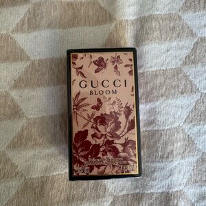 Gucci Bloom Fragrance with Red Floral Design
